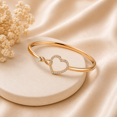 Elegant Gold-Tone Heart Crystal Bangle
