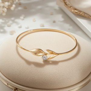 Elegant Gold-Tone Leaf Crystal Bangle
